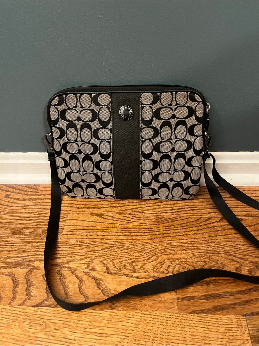 Coach signature monogram padded tablet case with a black stripe